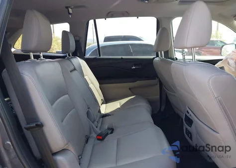 2018 Honda Pilot Touring from USA, damaged, VIN 5FNYF5H99JB021983